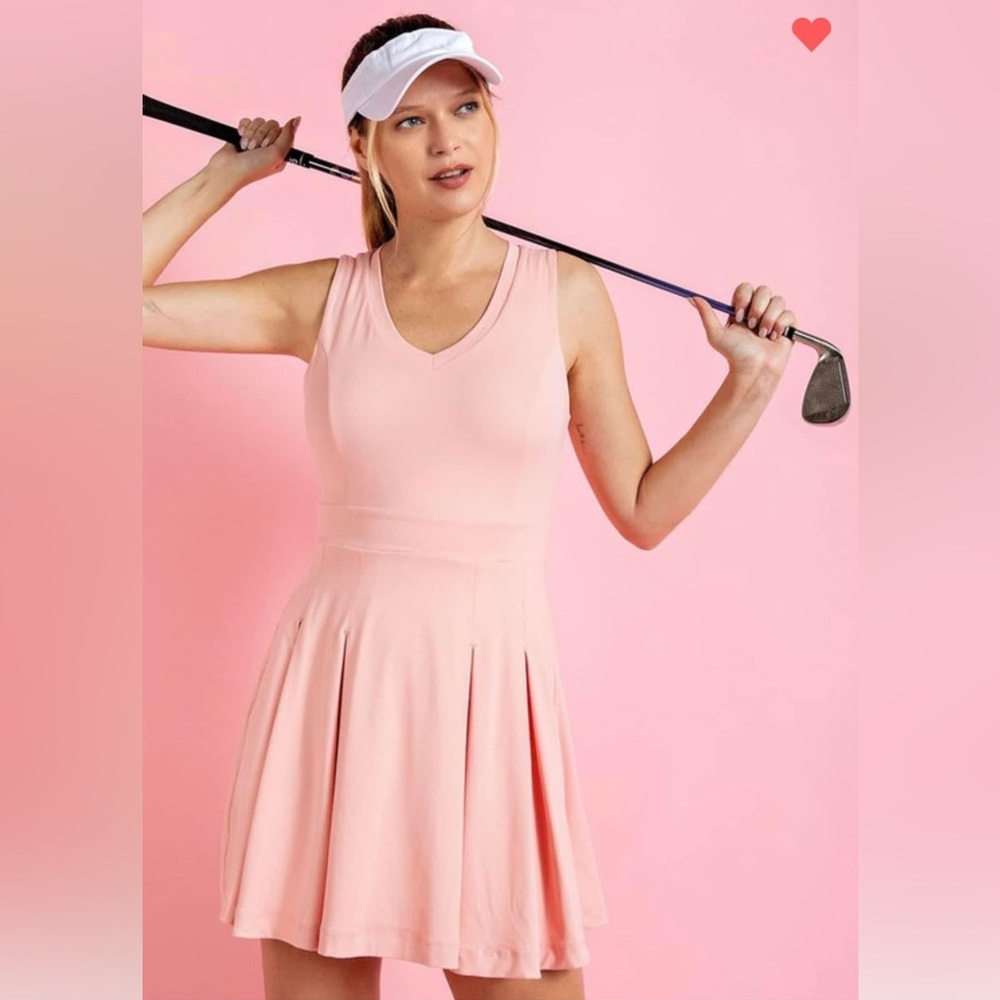 1 dress with spandex under shorts. 1 light pink New..never worn